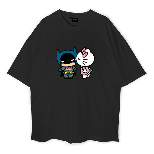 Black oversized t-shirt with cartoon character designs of Batman and Hello Kitty on the front.