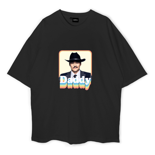 Black t-shirt with a graphic of a man in a hat and the word 'Daddy' on a white background