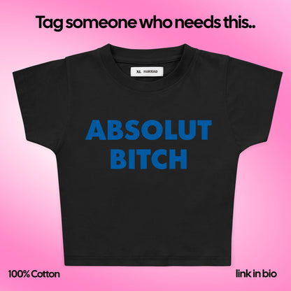 Black t-shirt with 'ABSOLUT BITCH' in blue on a pink background