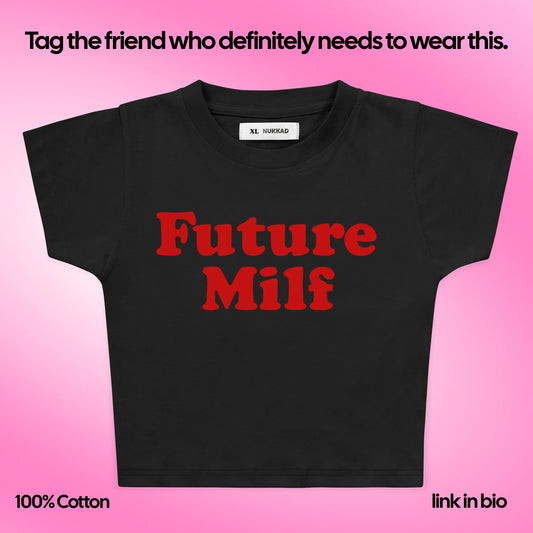 Black t-shirt with 'Future Milf' in red text on a pink background