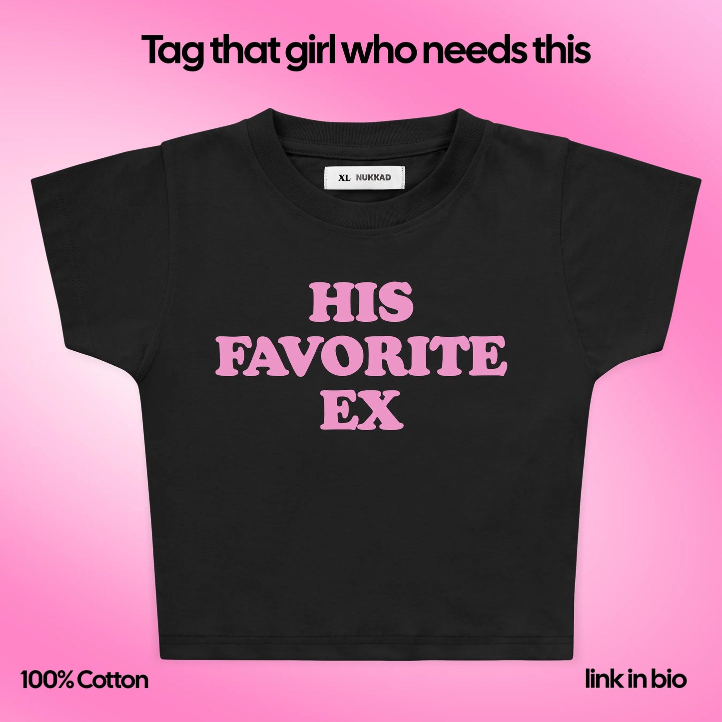Black t-shirt with pink text on a pink background