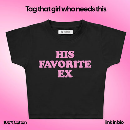 Black t-shirt with pink text on a pink background