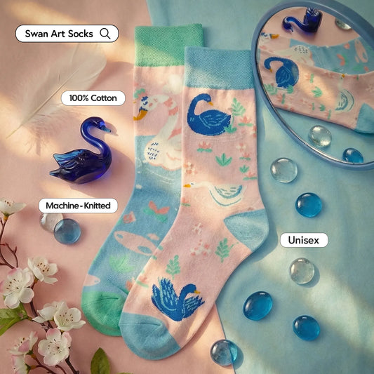 Swan-themed socks with a mirror and decorative elements on a soft pink background