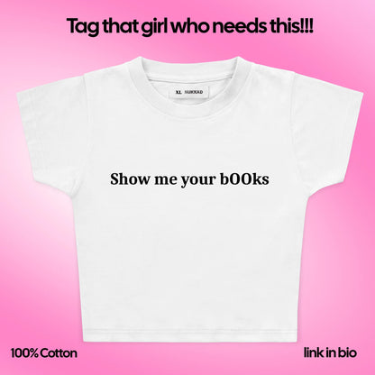 White t-shirt with text on a pink background
