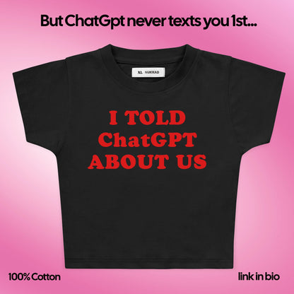 Black t-shirt with red text on a pink background