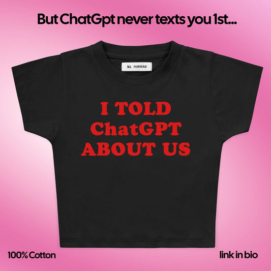 Black t-shirt with red text on a pink background