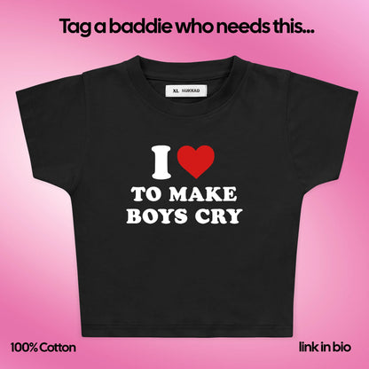 Black t-shirt with 'I ❤️ to make boys cry' text on a pink background